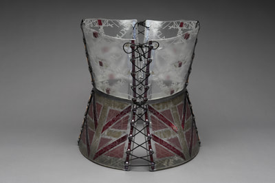 Glass corset (back view); clear glass, copper/ aluminium inclusions, coloured glass and sandblasting. Collaboration with Louise Watson.