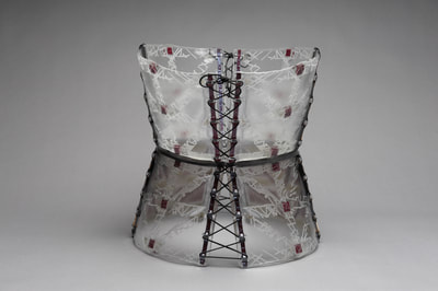 Glass corset (front view); clear glass, copper/ aluminium inclusions, coloured glass and sandblasting. Collaboration with Louise Watson.